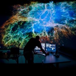 Justin Bartel at the Controls of the Universe